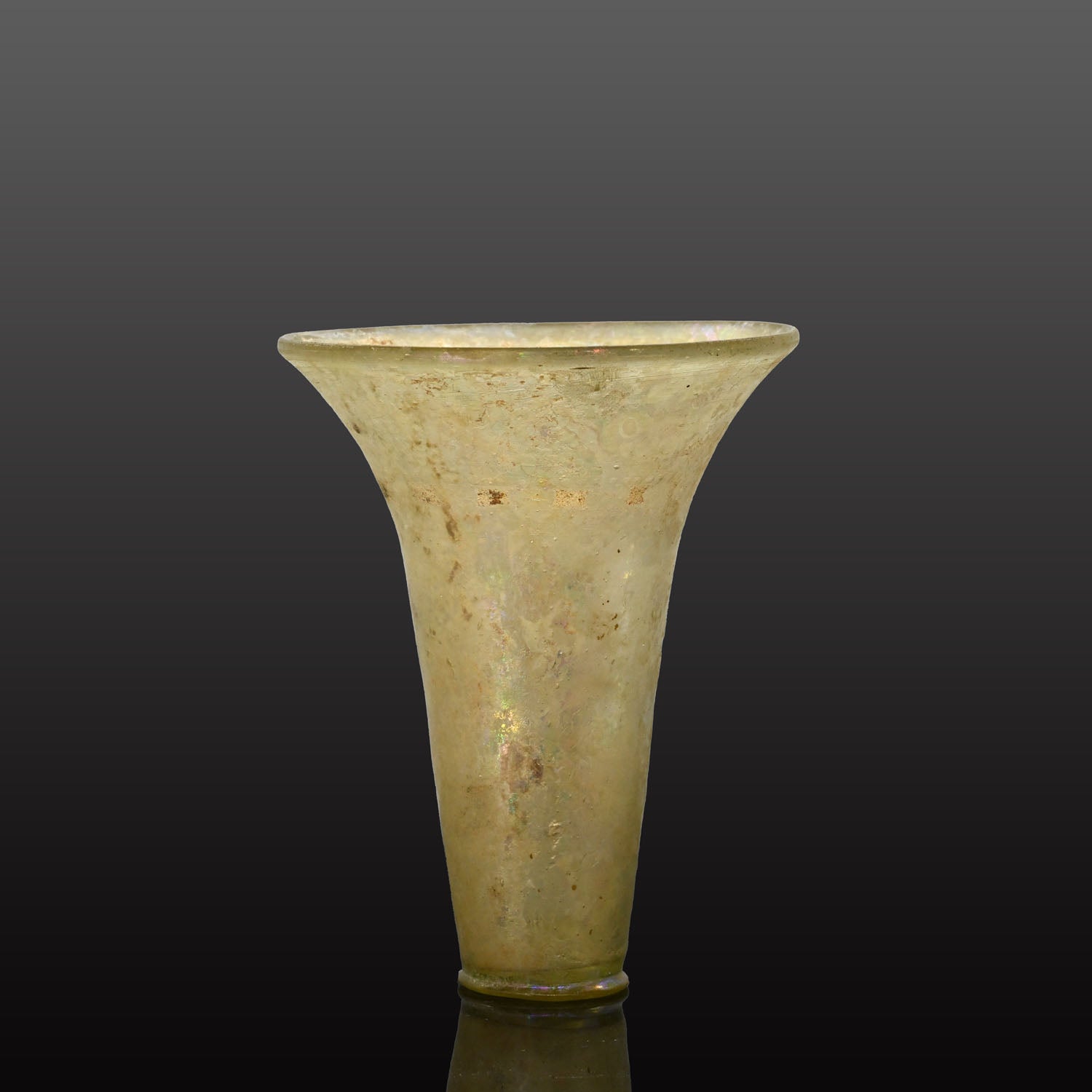 A fine Islamic Glass Beaker, Mamluk Period, ca. 13th - 14th century CE