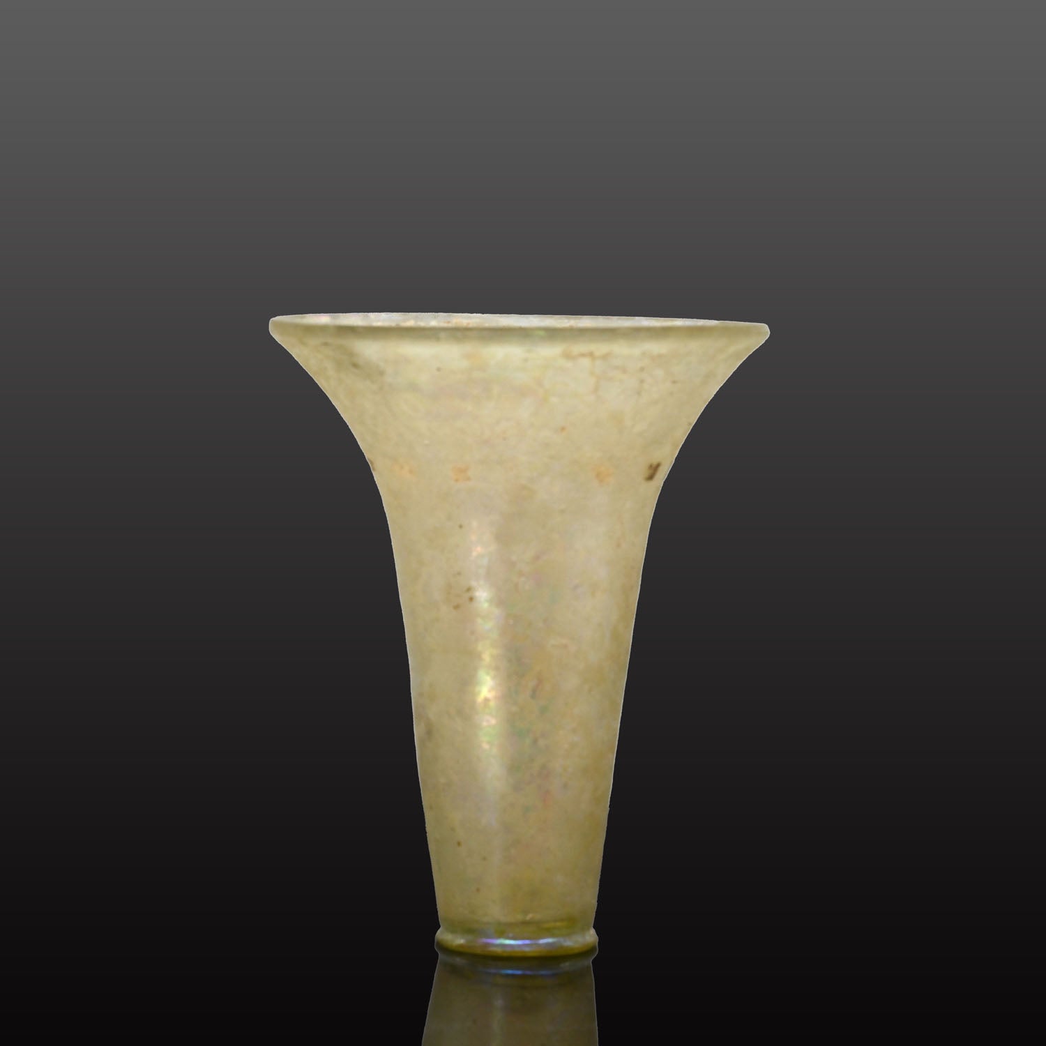 A fine Islamic Glass Beaker, Mamluk Period, ca. 13th - 14th century CE