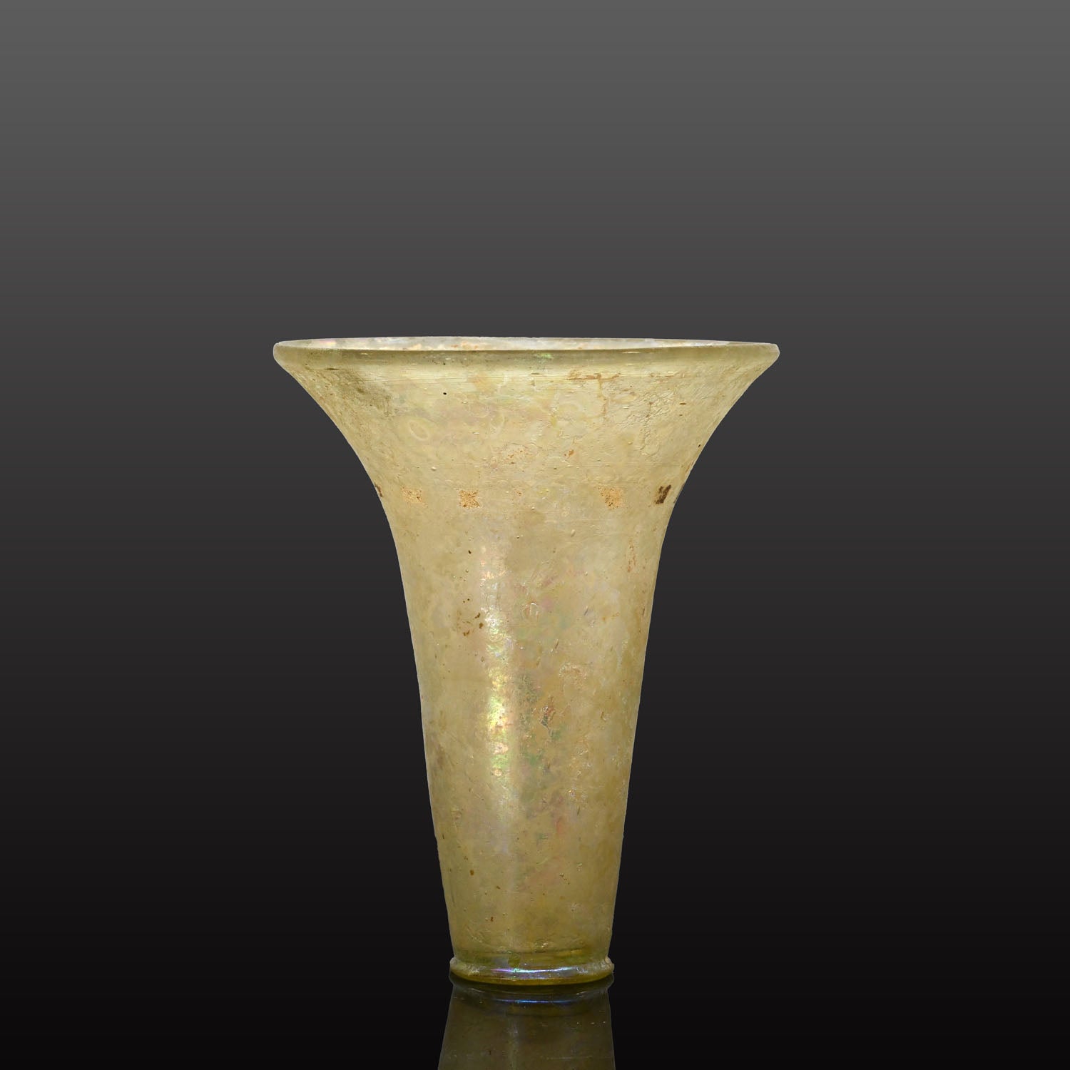 A fine Islamic Glass Beaker, Mamluk Period, ca. 13th - 14th century CE