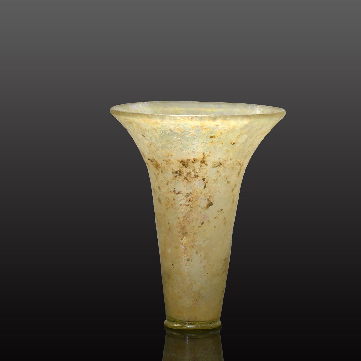 A fine Islamic Glass Beaker, Mamluk Period, ca. 13th - 14th century CE
