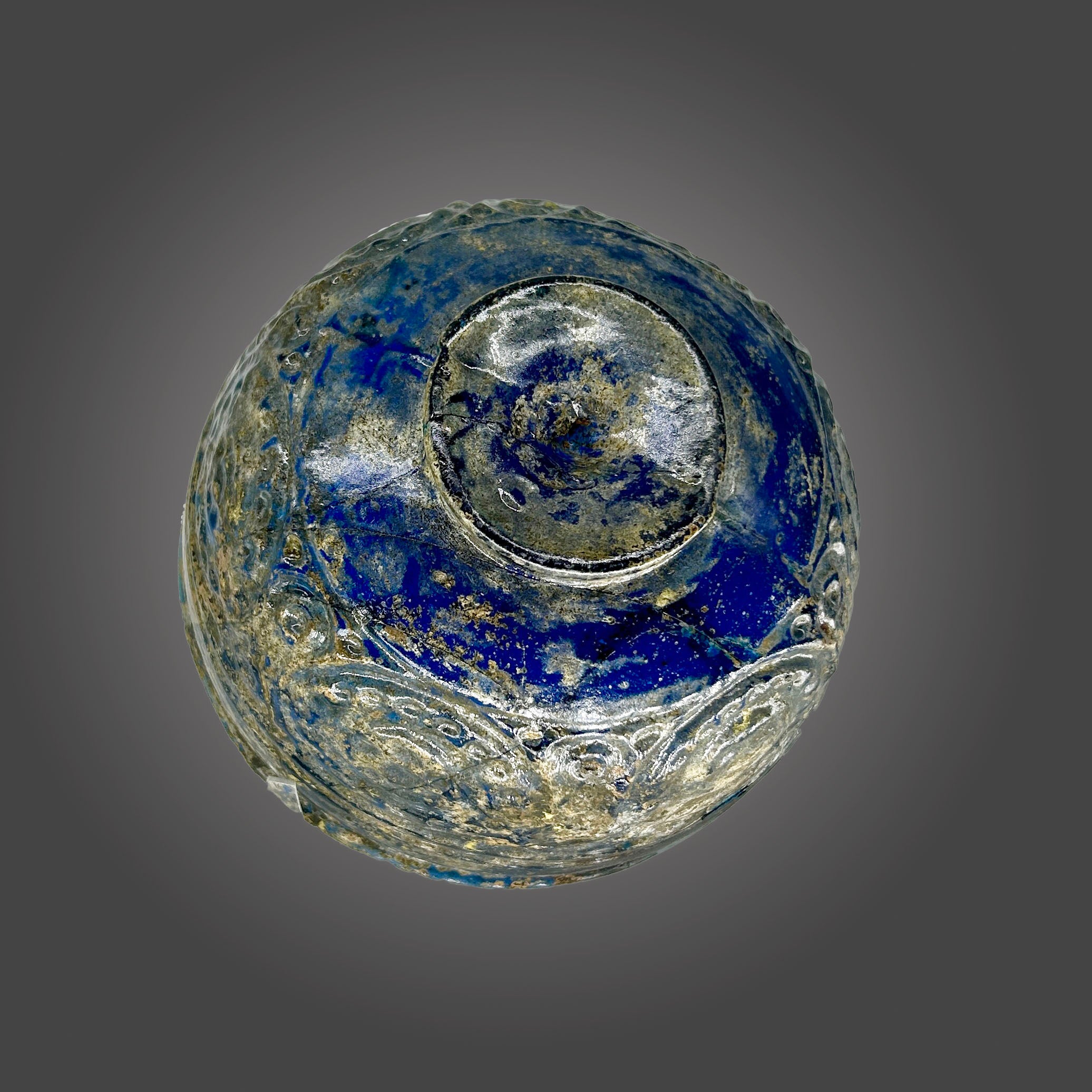 A Rare Islamic Molded Cobalt Blue Glass Bowl, Early Islamic Period, ca. 7th - 10th century CE