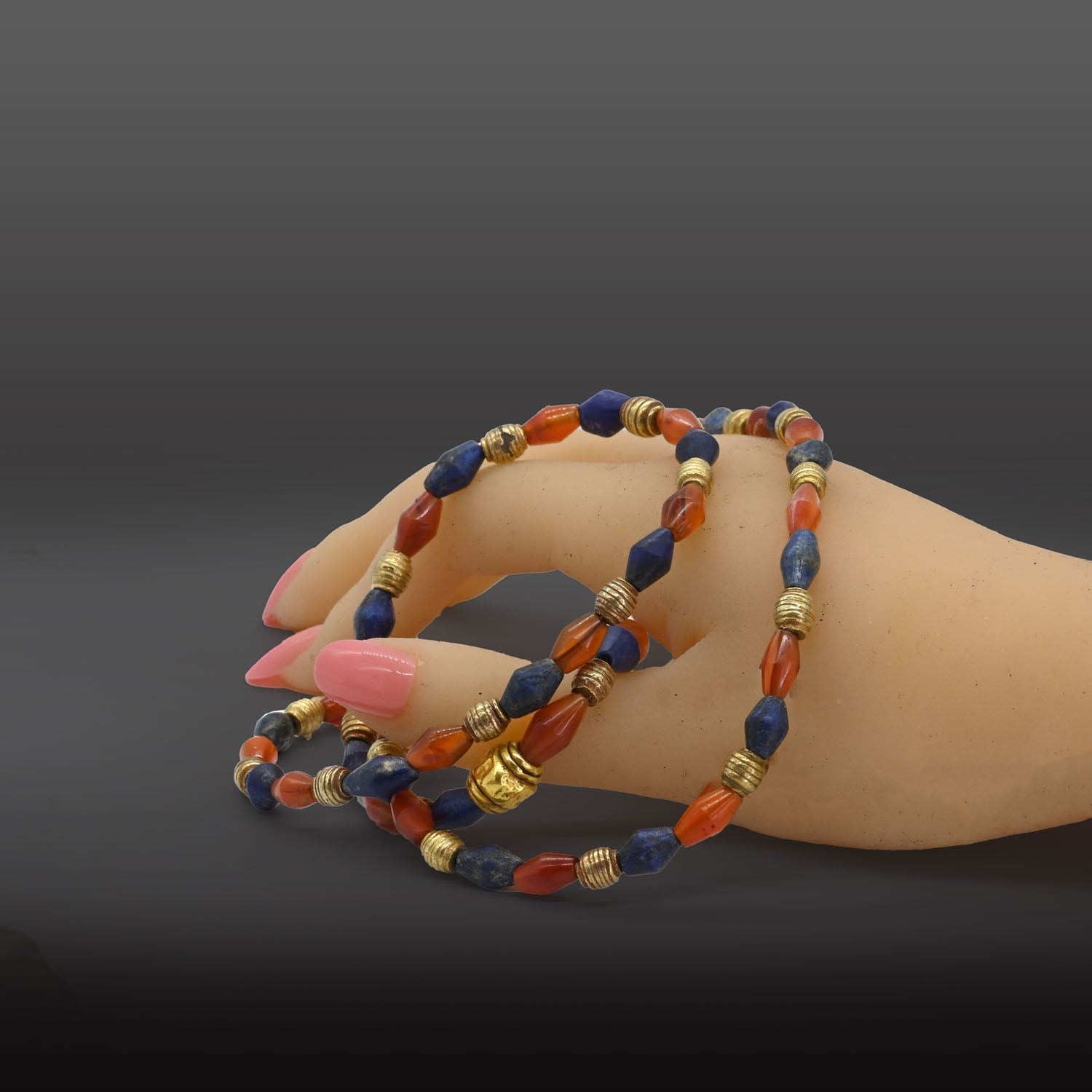 A Neo-Babylonian Lapis, Carnelian, and Gold Necklace, Neo Babylonian Period, ca. 626 - 539 BCE