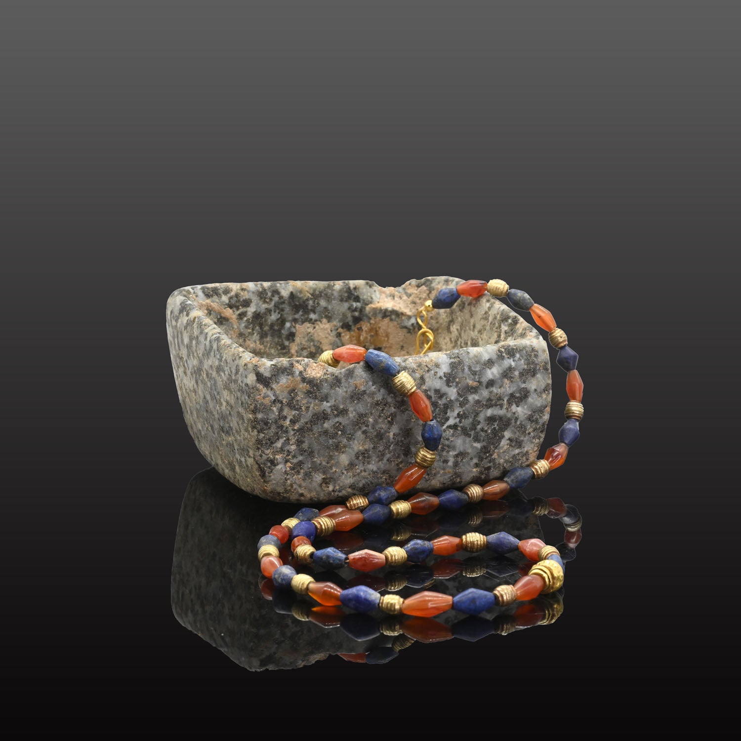 A Neo-Babylonian Lapis, Carnelian, and Gold Necklace, Neo Babylonian Period, ca. 626 - 539 BCE