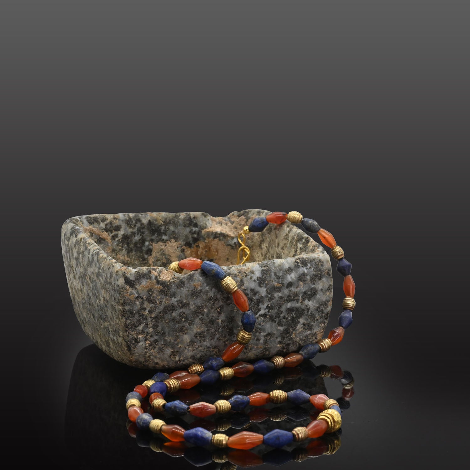 A Neo-Babylonian Lapis, Carnelian, and Gold Necklace, Neo Babylonian Period, ca. 626 - 539 BCE