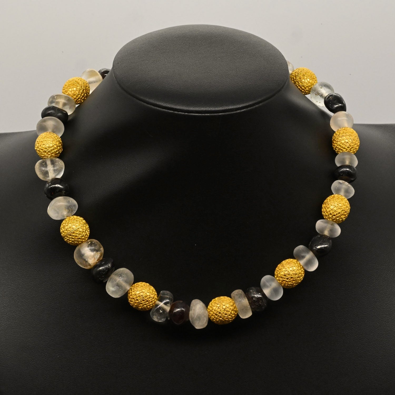 An Elegant Byzantine Gold, Quartz and Garnet Bead Necklace, ca. 9th century CE