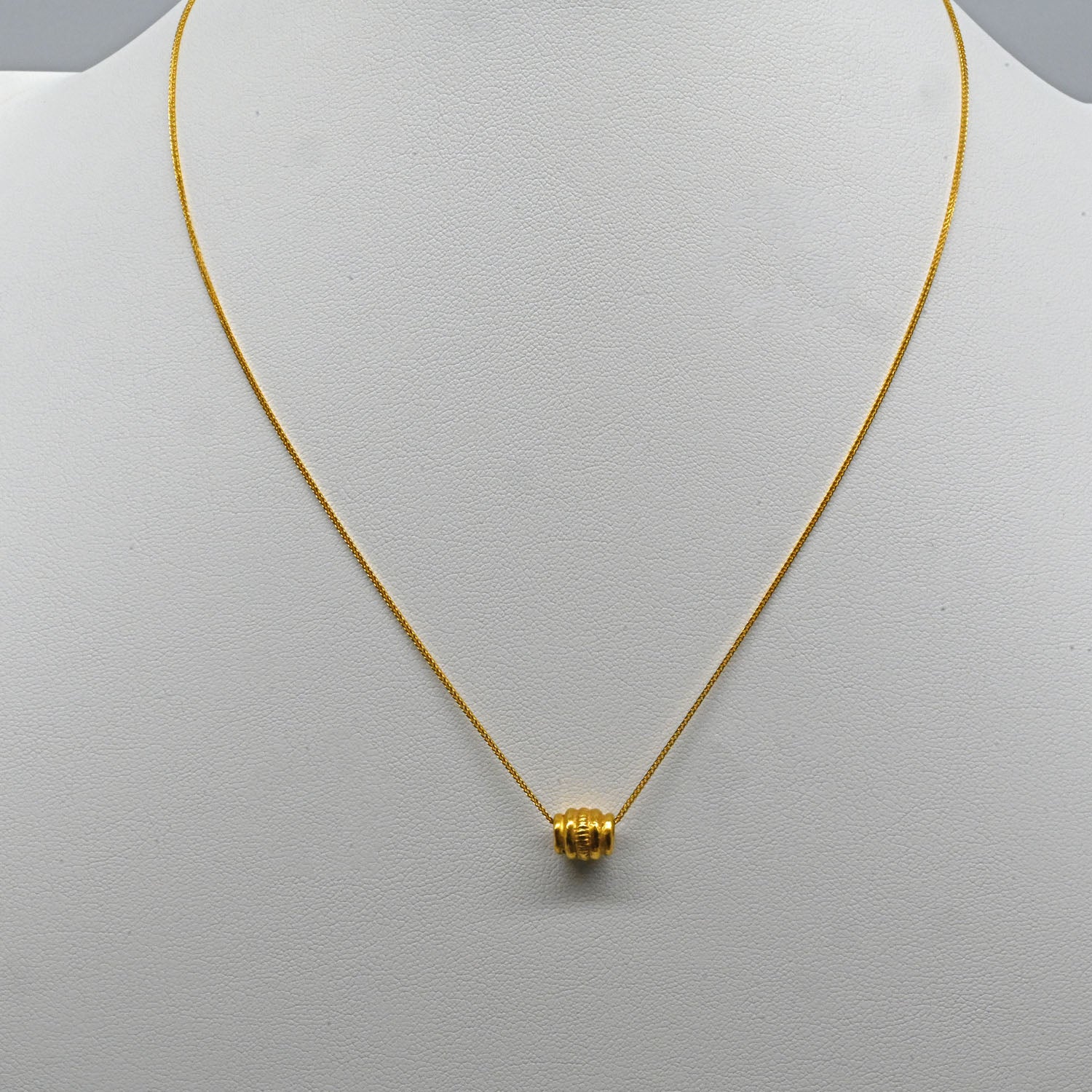 A Persian Gold Bead Pendant, Achaemenid Period, ca. 550 - 330 BCE