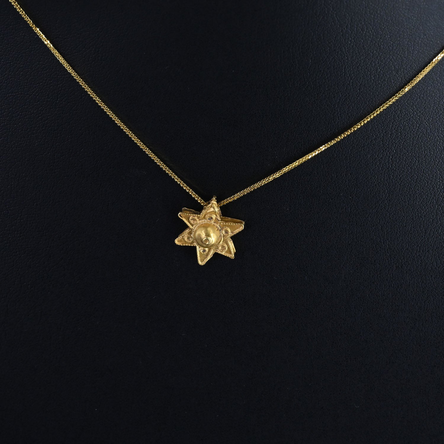 A Byzantine Gold Star Pendant, Eastern Mediterranean, ca. 6th–8th century CE