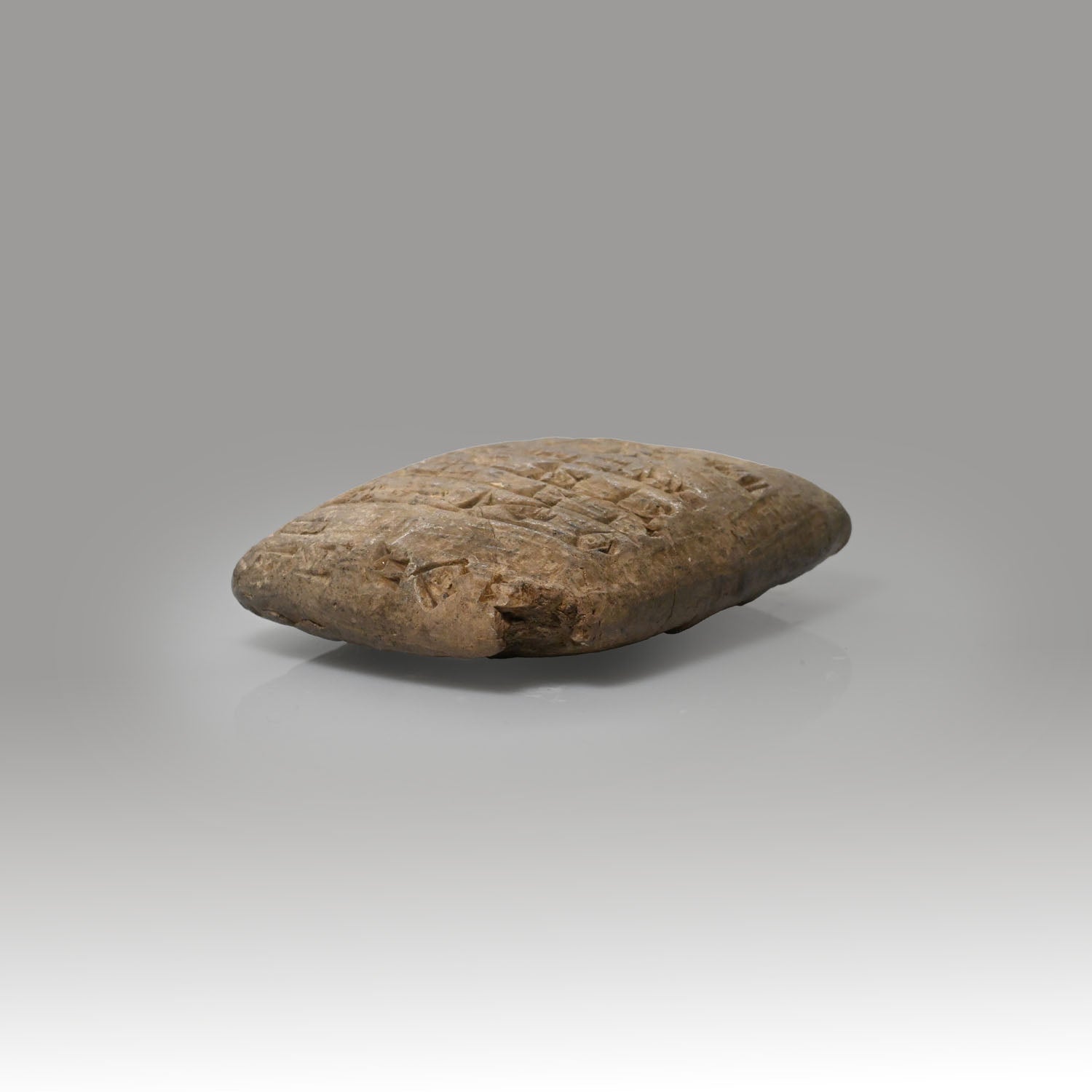 A Mesopotamian Clay Cuneiform Tablet, ca. 2000 BCE