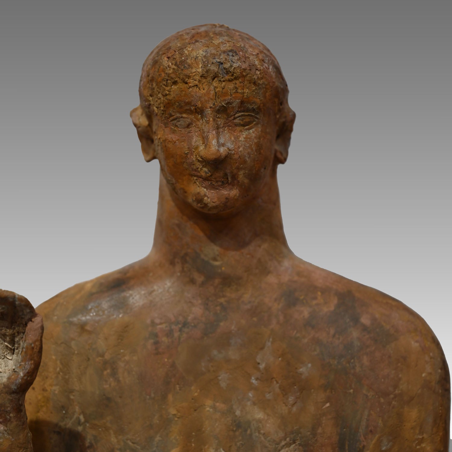 A large Phoenician terracotta standing youth, Neo Assyrian Period, ca. 6th century BCE