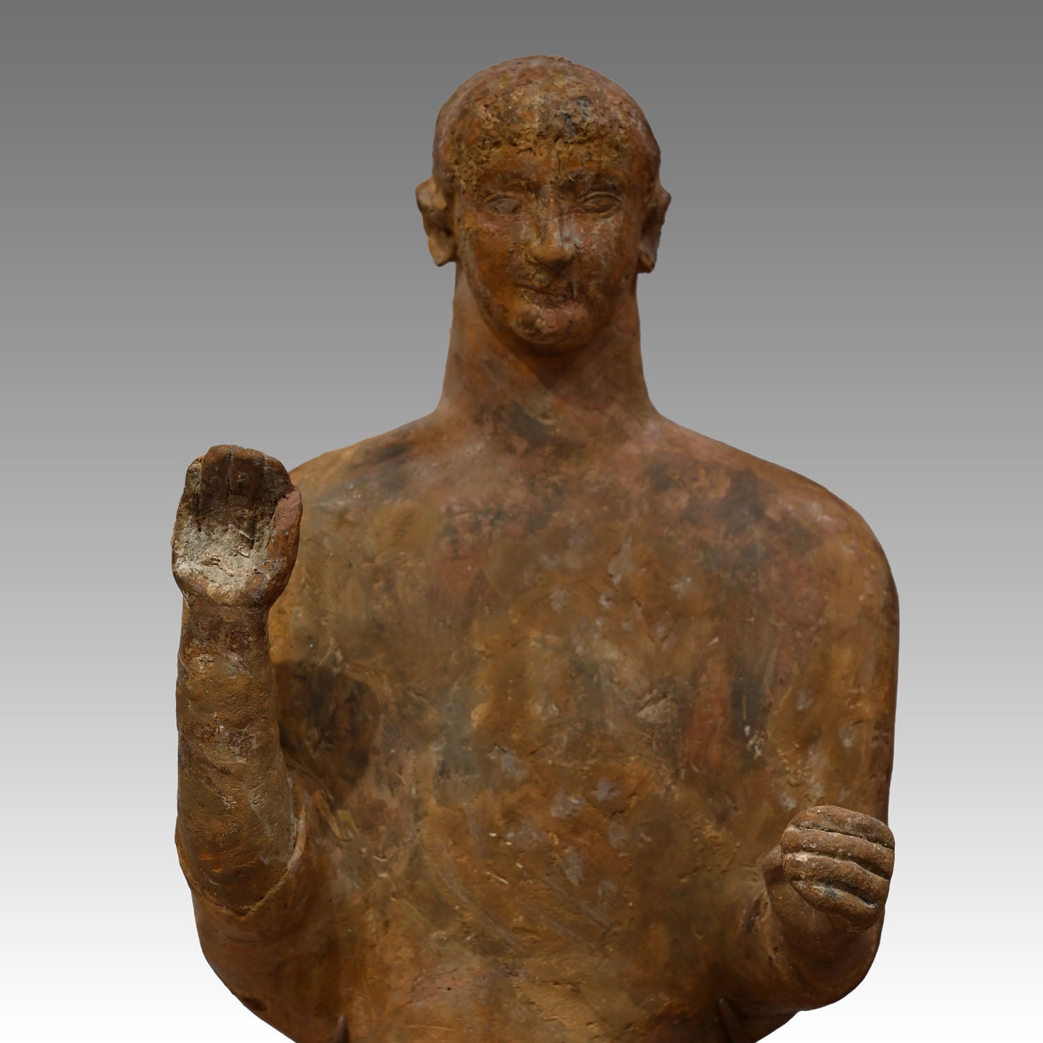 A large Phoenician terracotta standing youth, Neo Assyrian Period, ca. 6th century BCE