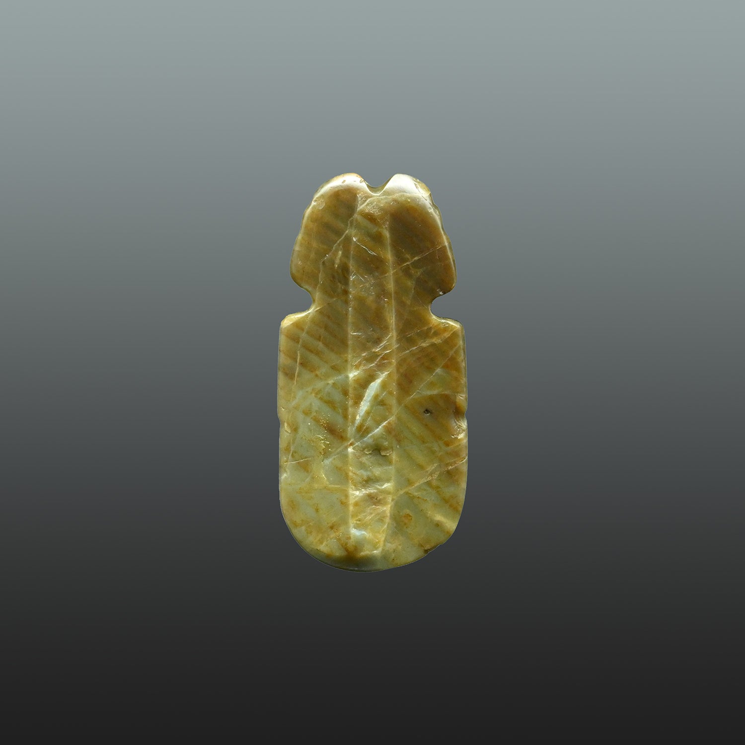 A Costa Rican Greenstone Axe God Pendant, Early Classic Period, ca. 100 - 600 CE