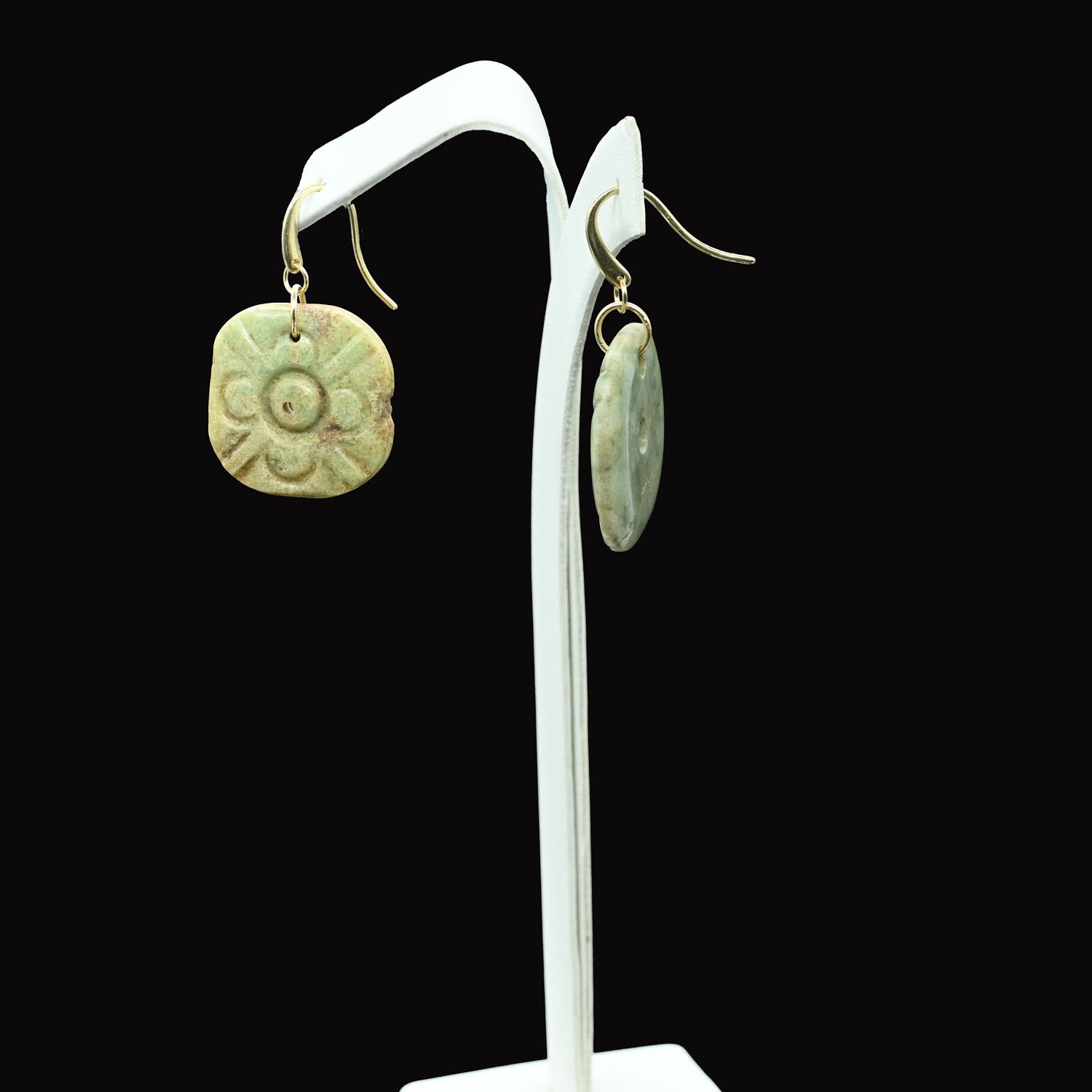 A pair of Mixtec Jade Floral Appliques, ca. 600 - 800 CE