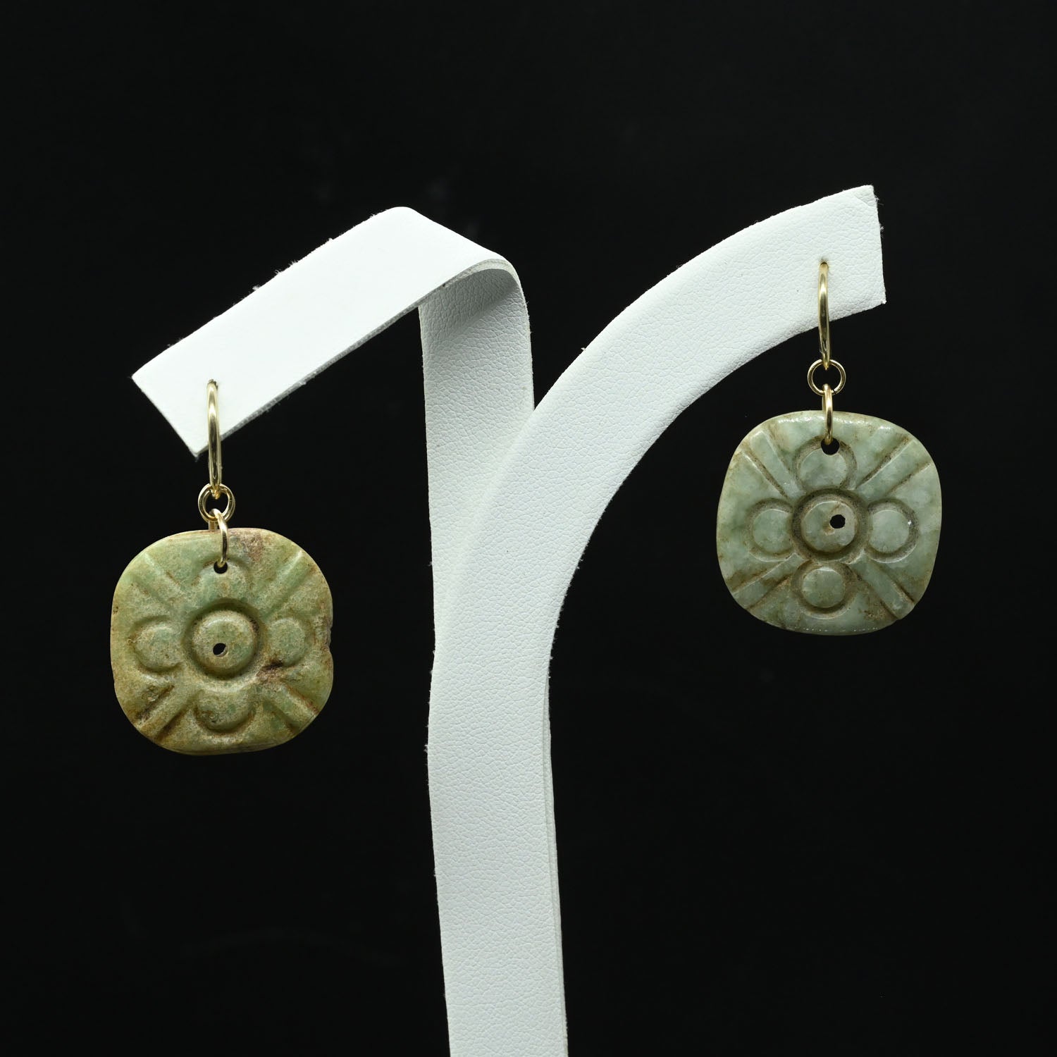 A pair of Mixtec Jade Floral Appliques, ca. 600 - 800 CE