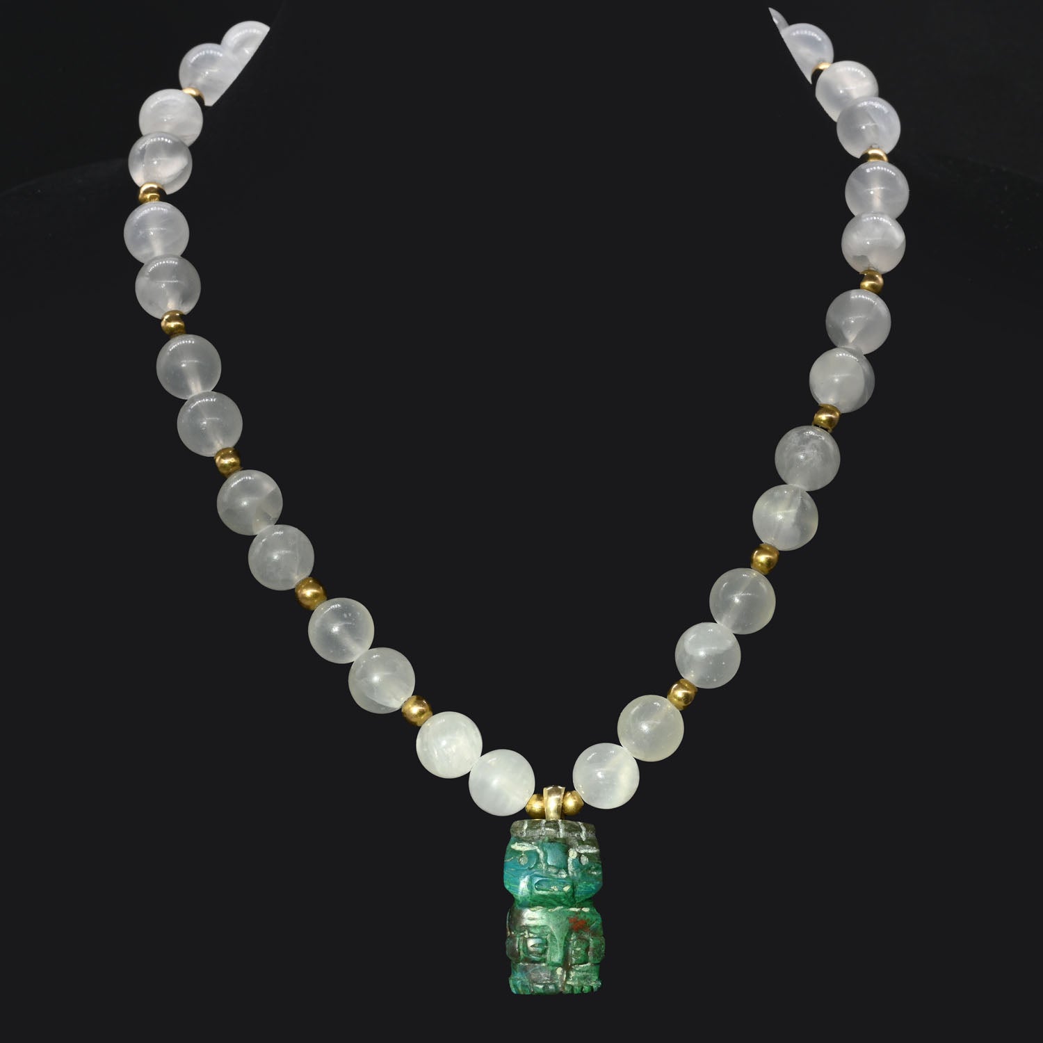 A Chimu-Inca Chrysocolla Pendant, ca. 800 - 1425 CE