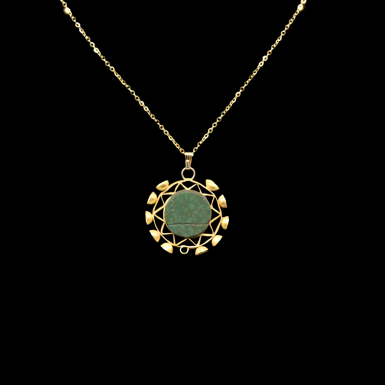 A Moche-Sicán Chrysocolla and Gold Pendant, Early Intermediate - Middle Horizon Period, ca. 500 - 1000 CE