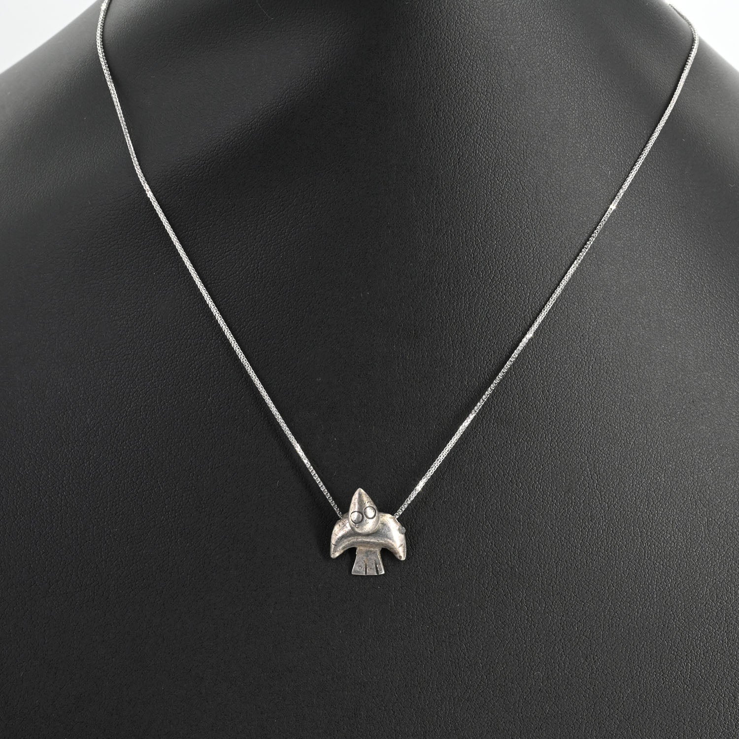 A superb Moche Silver Sea Bird Pendant, ca. 100 BCE - 300 CE