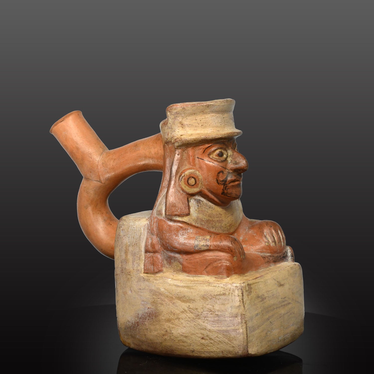 A Moche Seated Noble Effigy Vessel, Moche II, ca. 200 - 400 CE