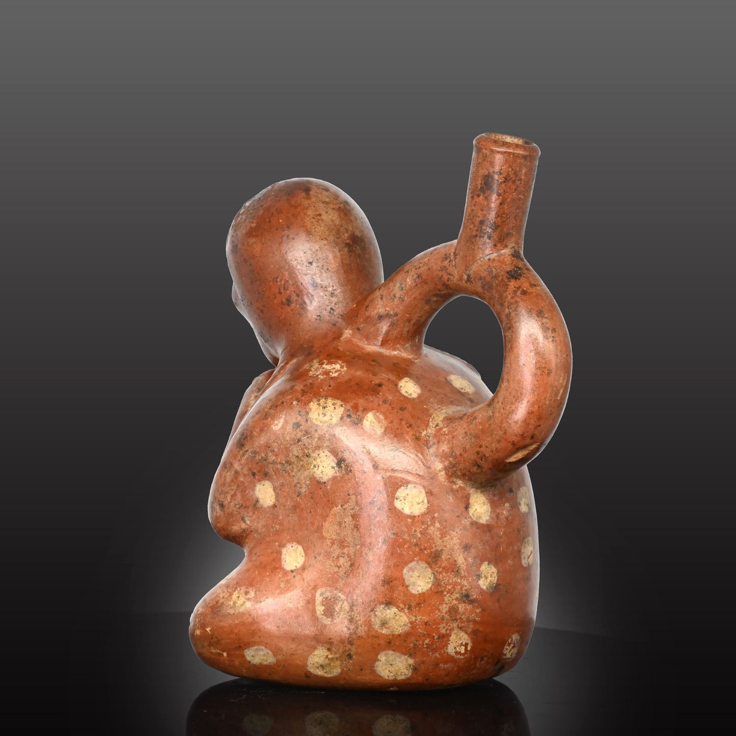 Moche stirrup-spout figural bottle depicting a woman, ca. 300 - 500 CE