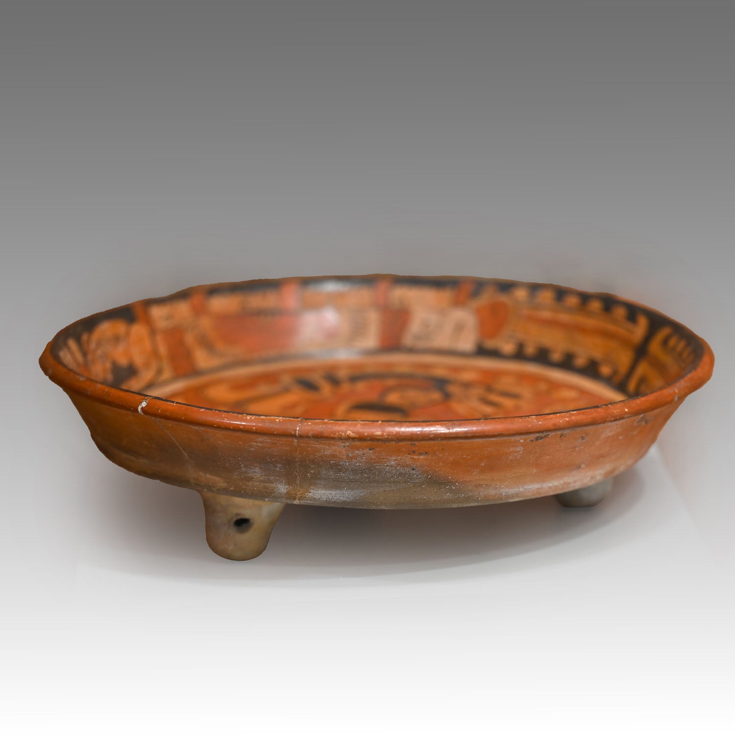 A Published Maya Polychrome Tripod Plate with Muan Bird Deity, Classic Period, ca. 500 - 800 CE