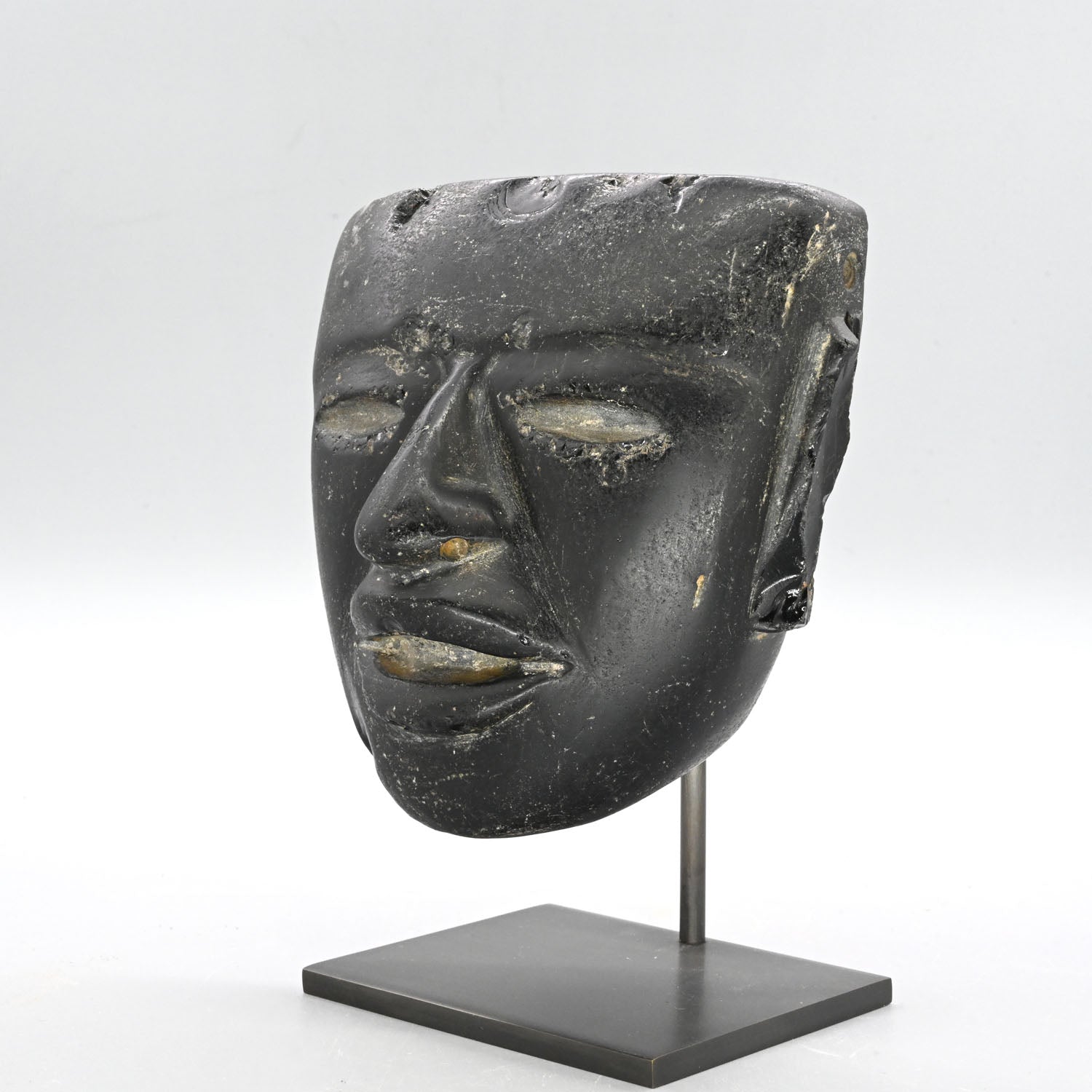 A fine Teotihuacan Obsidian Stone Mask, Early Classic Period, ca. 450 - 650 CE