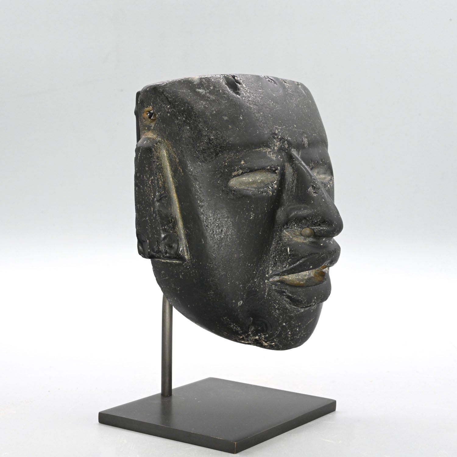 A fine Teotihuacan Obsidian Stone Mask, Early Classic Period, ca. 450 - 650 CE
