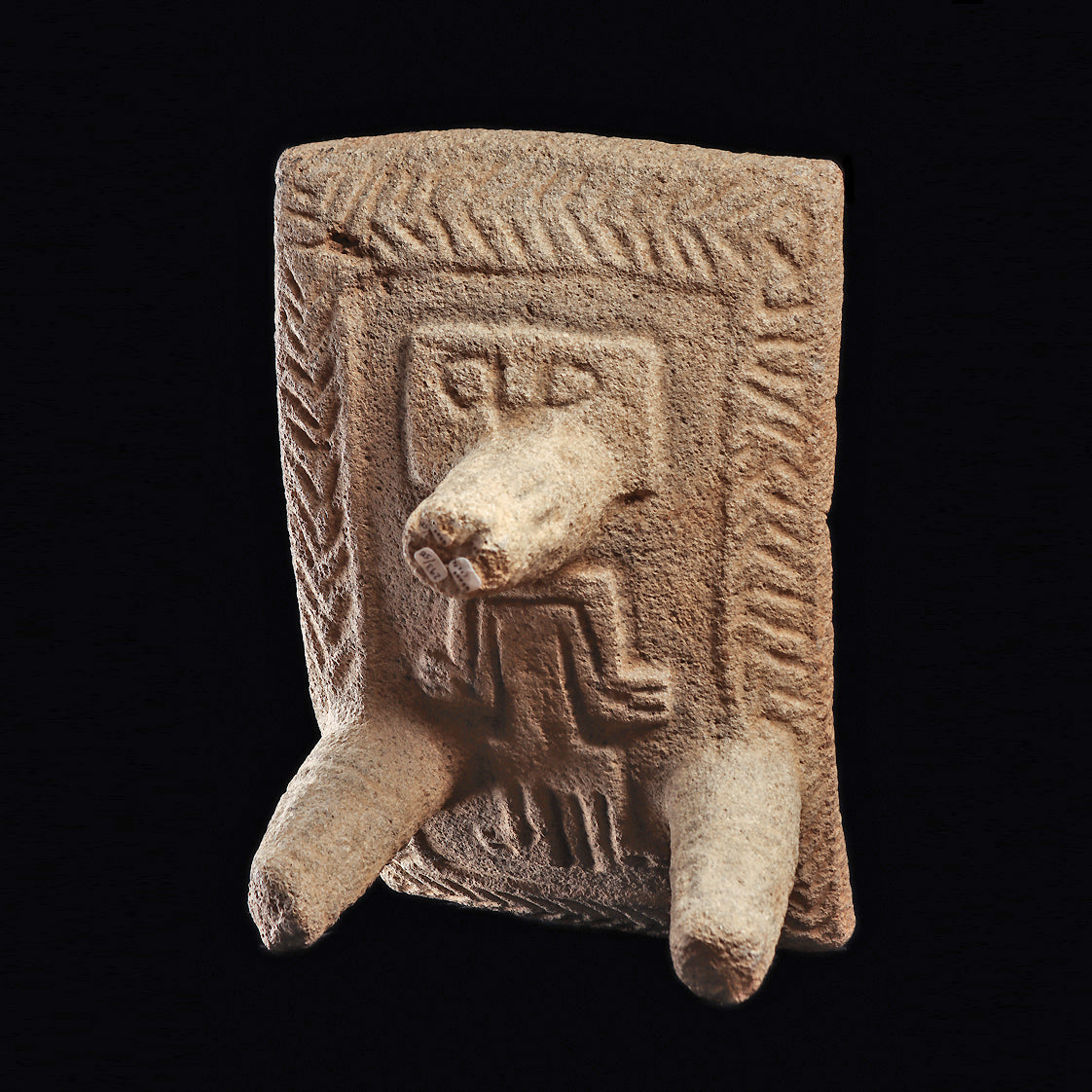 A Costa Rican Decorated Stone Metate, ca. 800 - 1200 CE