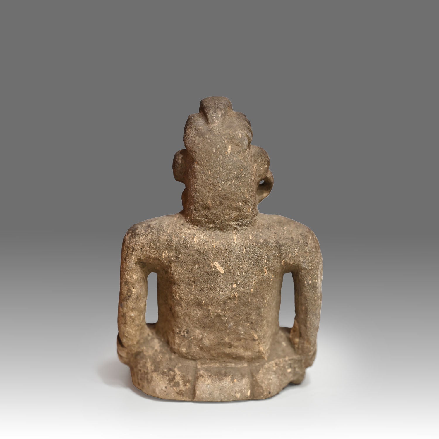 Maya Sandstone Seated Deity Figure, ca. 200 - 500 CE