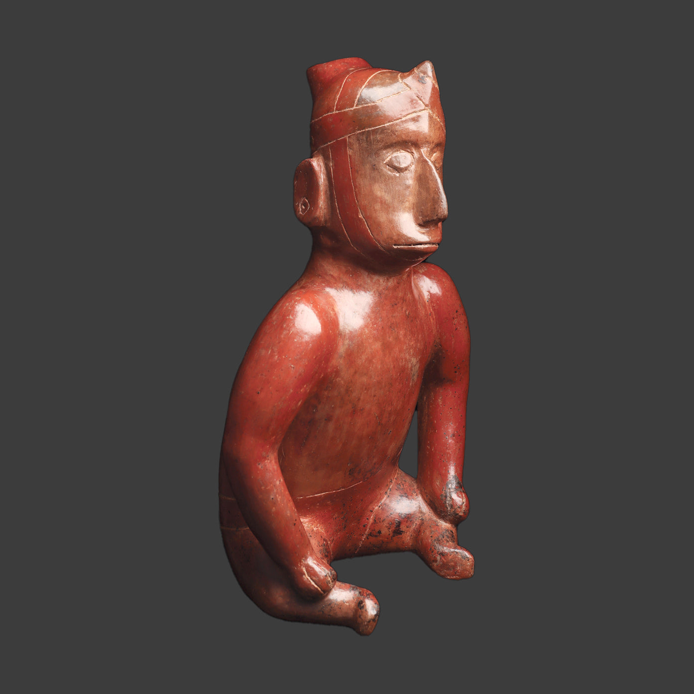 A Colima Seated Shaman Figure, ca. 100 BCE - 250 CE