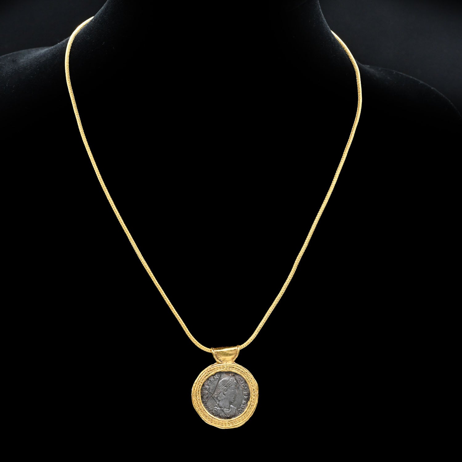 A Late Roman Constantinus II Silver Coin set in a Gold Pendant, ca. 337 - 361 CE