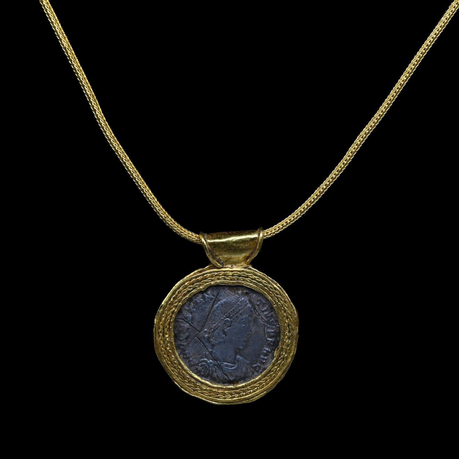 A Late Roman Constantinus II Silver Coin set in a Gold Pendant, ca. 337 - 361 CE