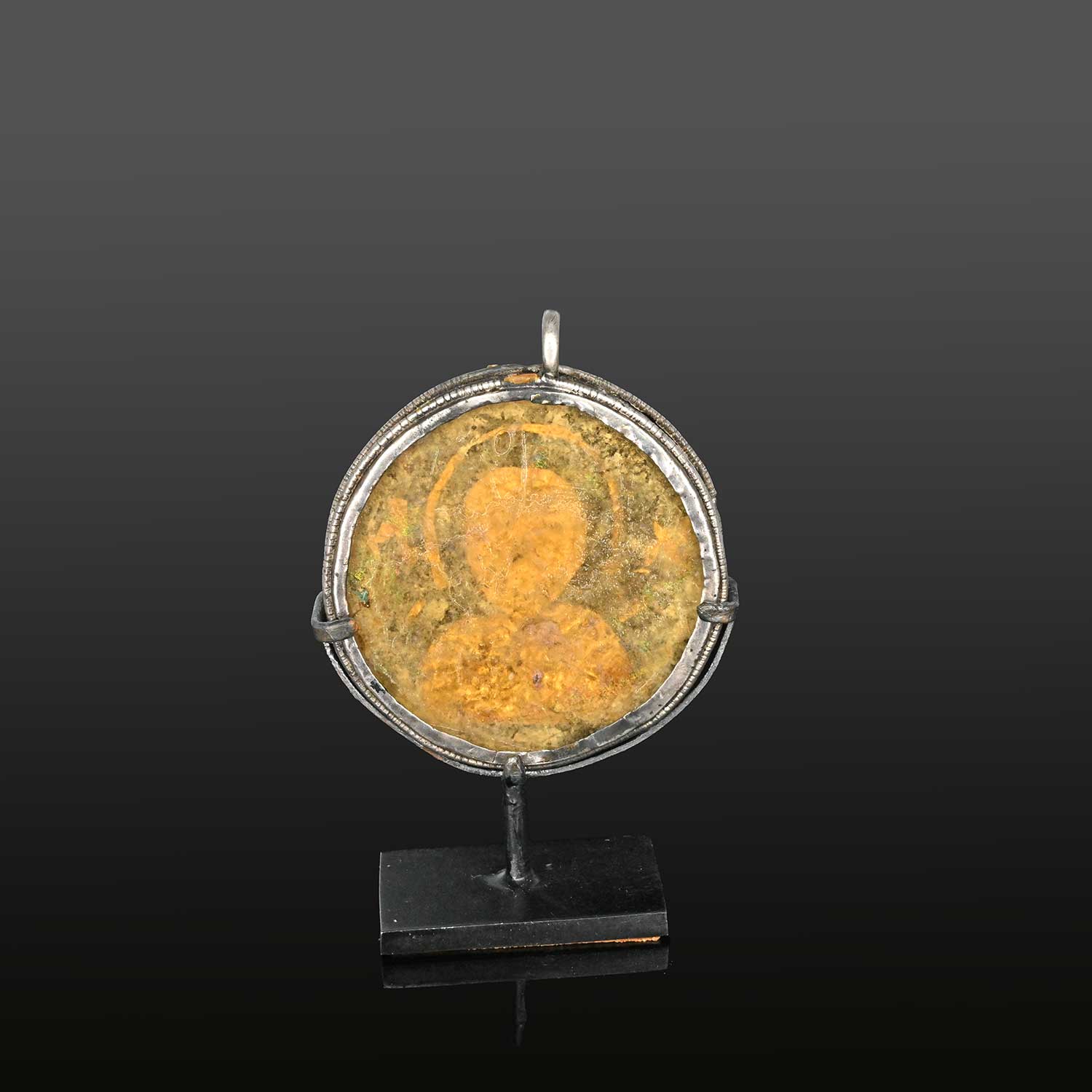 A Byzantine Silver and Glass Pendant, Byzantine Empire, ca. 5th - 6th century CE