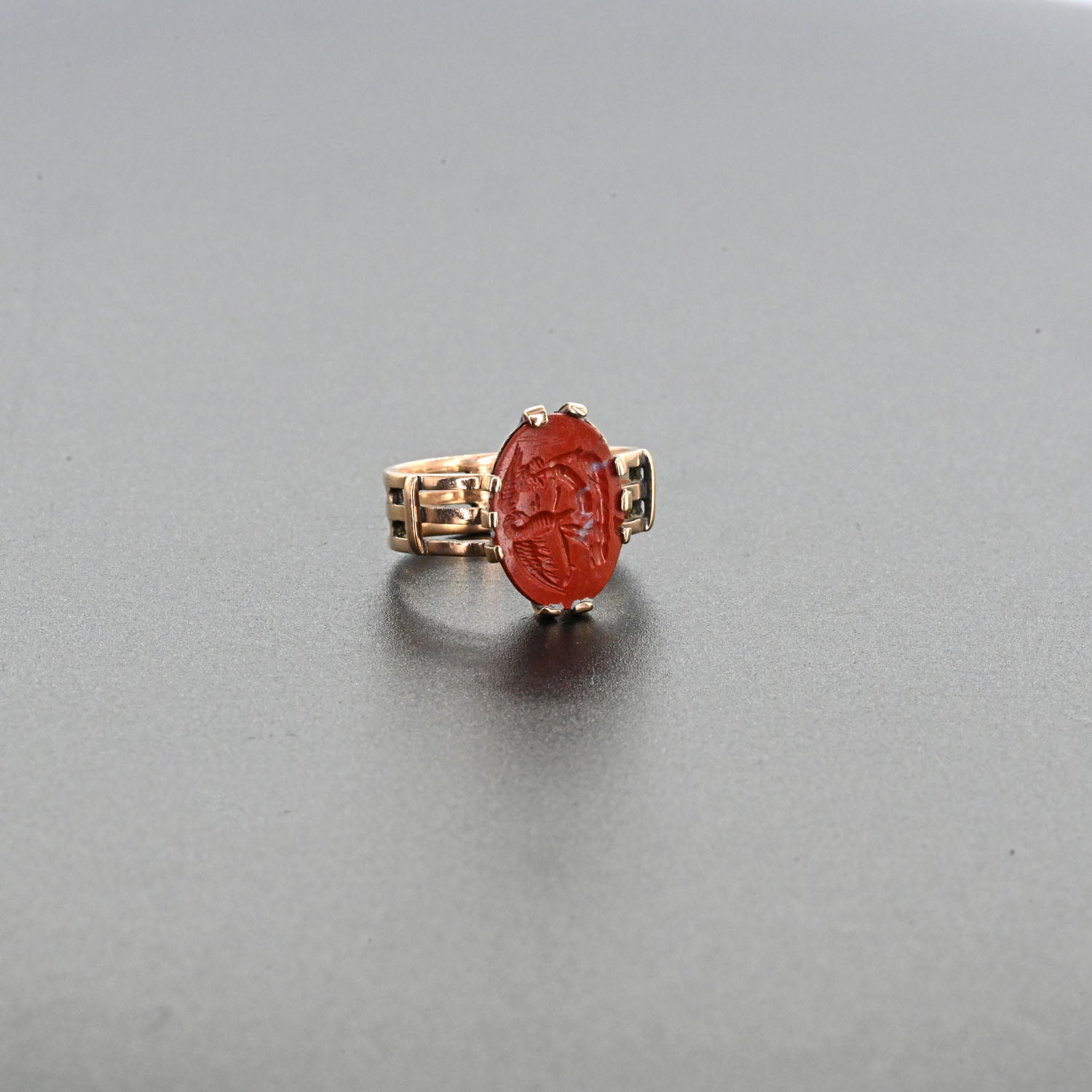 A Roman Red Jasper Intaglio of Leda and the Swan set as a ring, Roman Imperial Period, ca. 1st - 2nd century CE