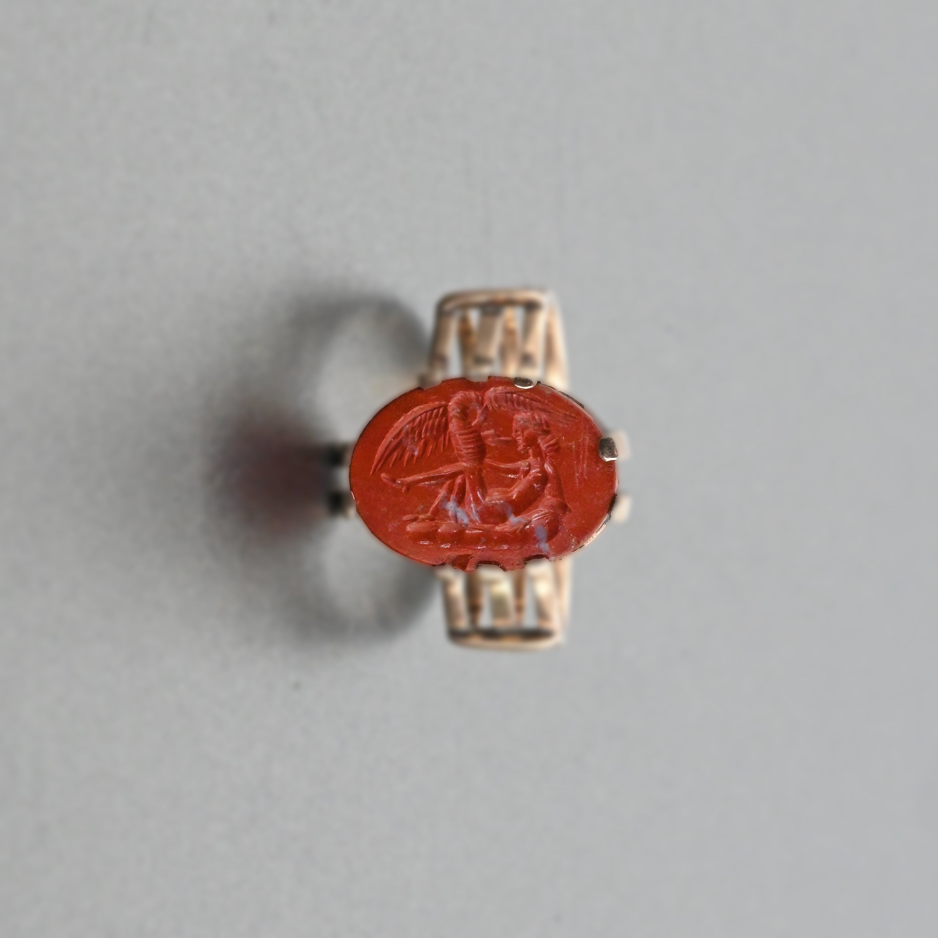 A Roman Red Jasper Intaglio of Leda and the Swan set as a ring, Roman Imperial Period, ca. 1st - 2nd century CE