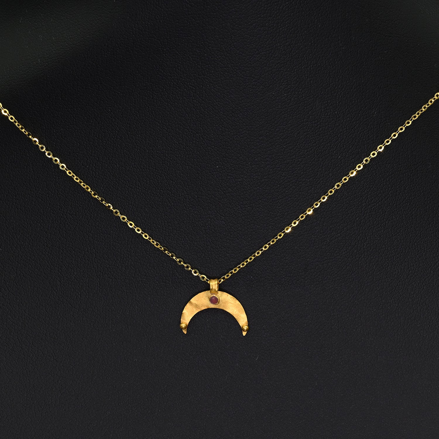 A Roman Gold and Garnet Lunar Pendant, Roman Imperial Period, ca. 2nd–3rd century CE