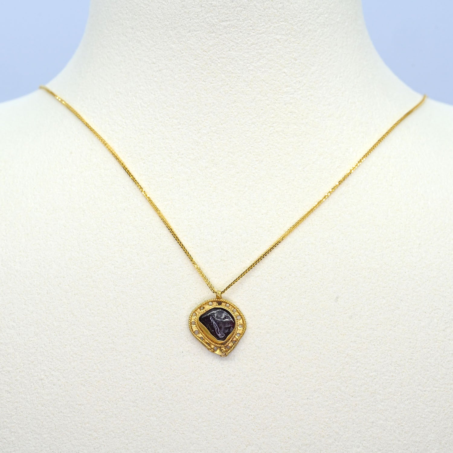 A Late Roman - Early Byzantine Gold and Garnet Pendant, ca. 4th - 6th century CE