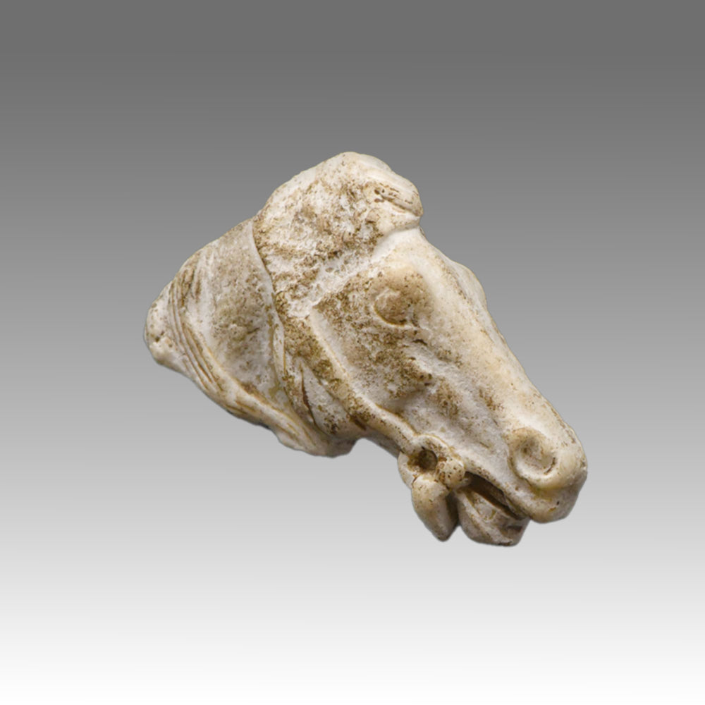 A Roman Limestone Fragment of a Horse Head, Roman Imperial Period, ca. 1st - 2nd century CE