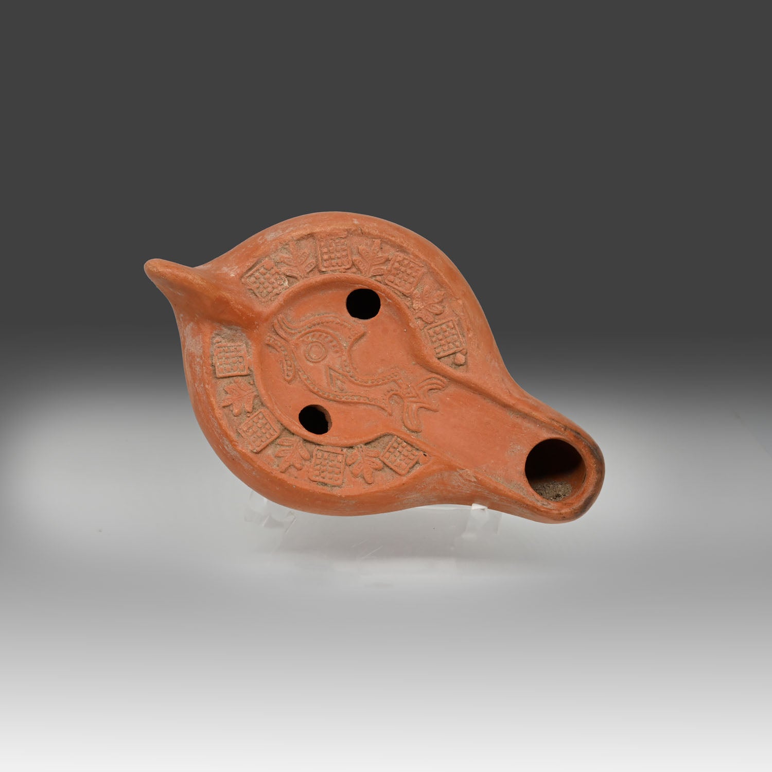 Roman African Red Slip Lamp with Dolphin Motif, Roman Imperial Period, ca. 3rd–4th century CE