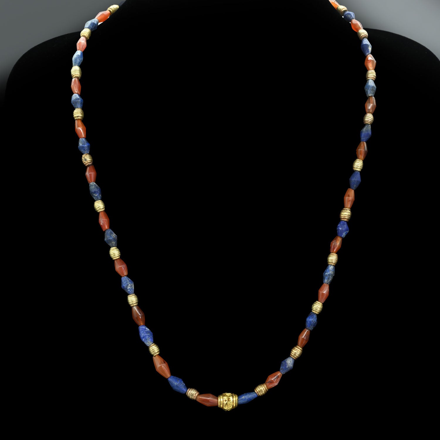 A Neo-Babylonian Lapis, Carnelian, and Gold Necklace, Neo Babylonian Period, ca. 626 - 539 BCE
