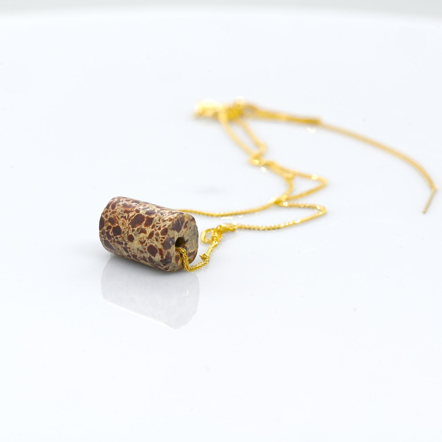 A Neo-Assyrian Brecciated Jasper Bead Pendant, 1st millennium BCE
