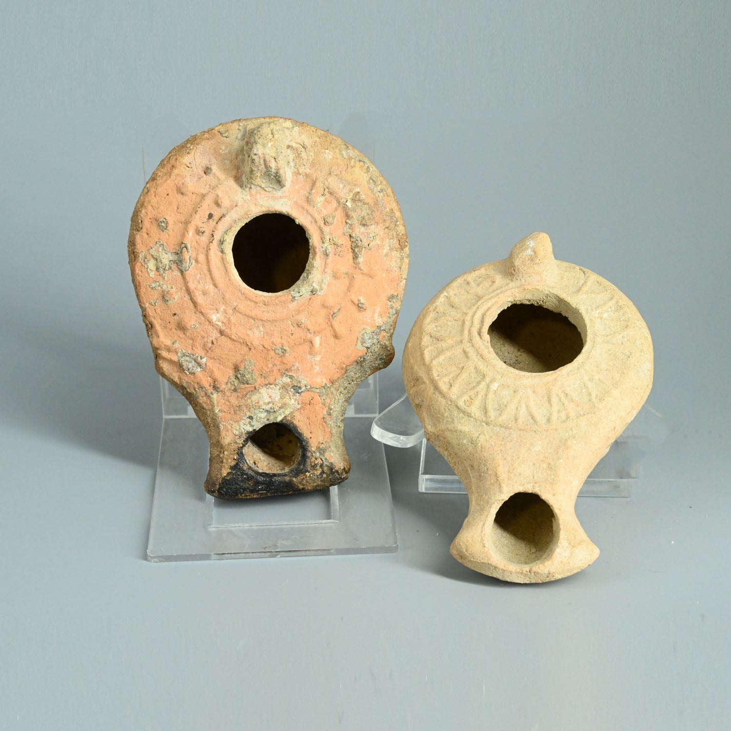 Two Judean Terracotta Oil Lamps, Roman Imperial Period, ca. 1st century CE