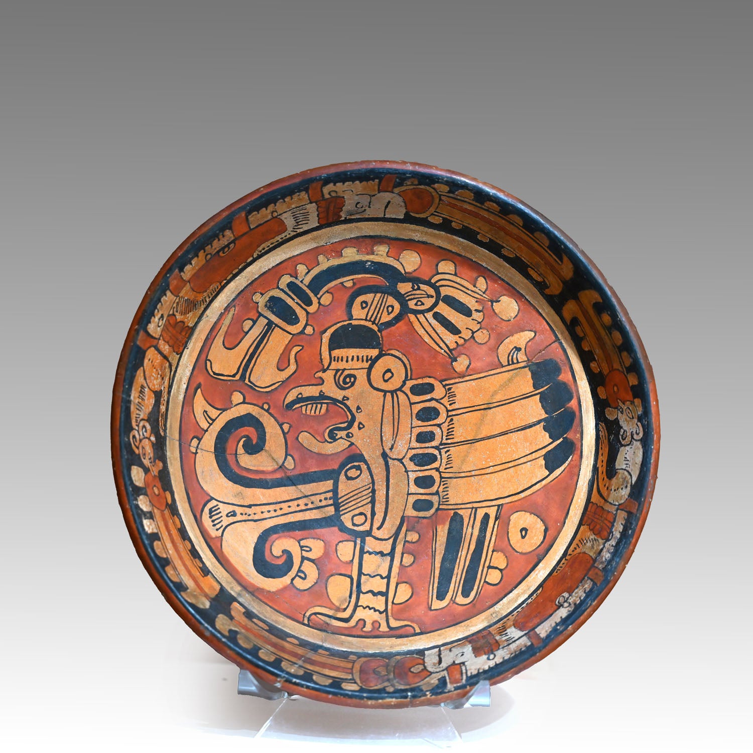 A Published Maya Polychrome Tripod Plate with Muan Bird Deity, Classic Period, ca. 500 - 800 CE
