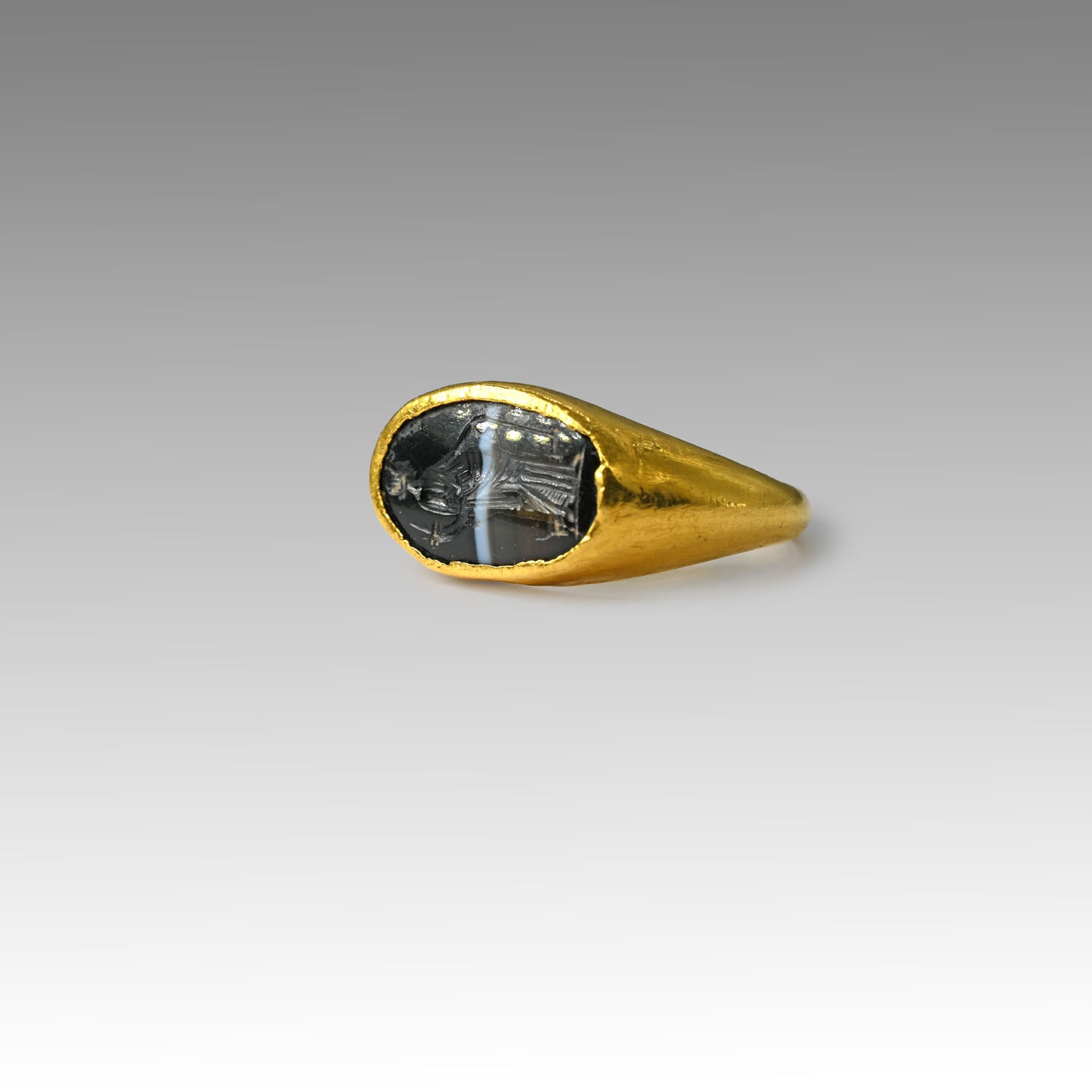 Roman Gold & Banded Agate Finger Ring with Intaglio of Fortuna, Roman Imperial Period, ca. 1st - 2nd century CE