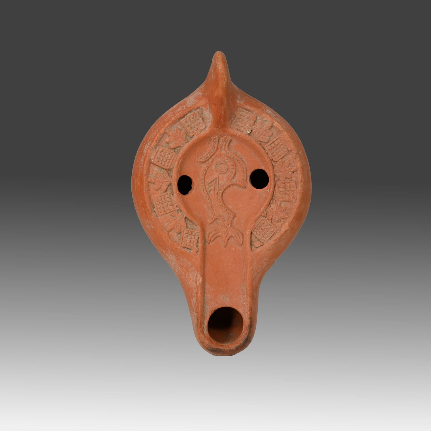 Roman African Red Slip Lamp with Dolphin Motif, Roman Imperial Period, ca. 3rd–4th century CE