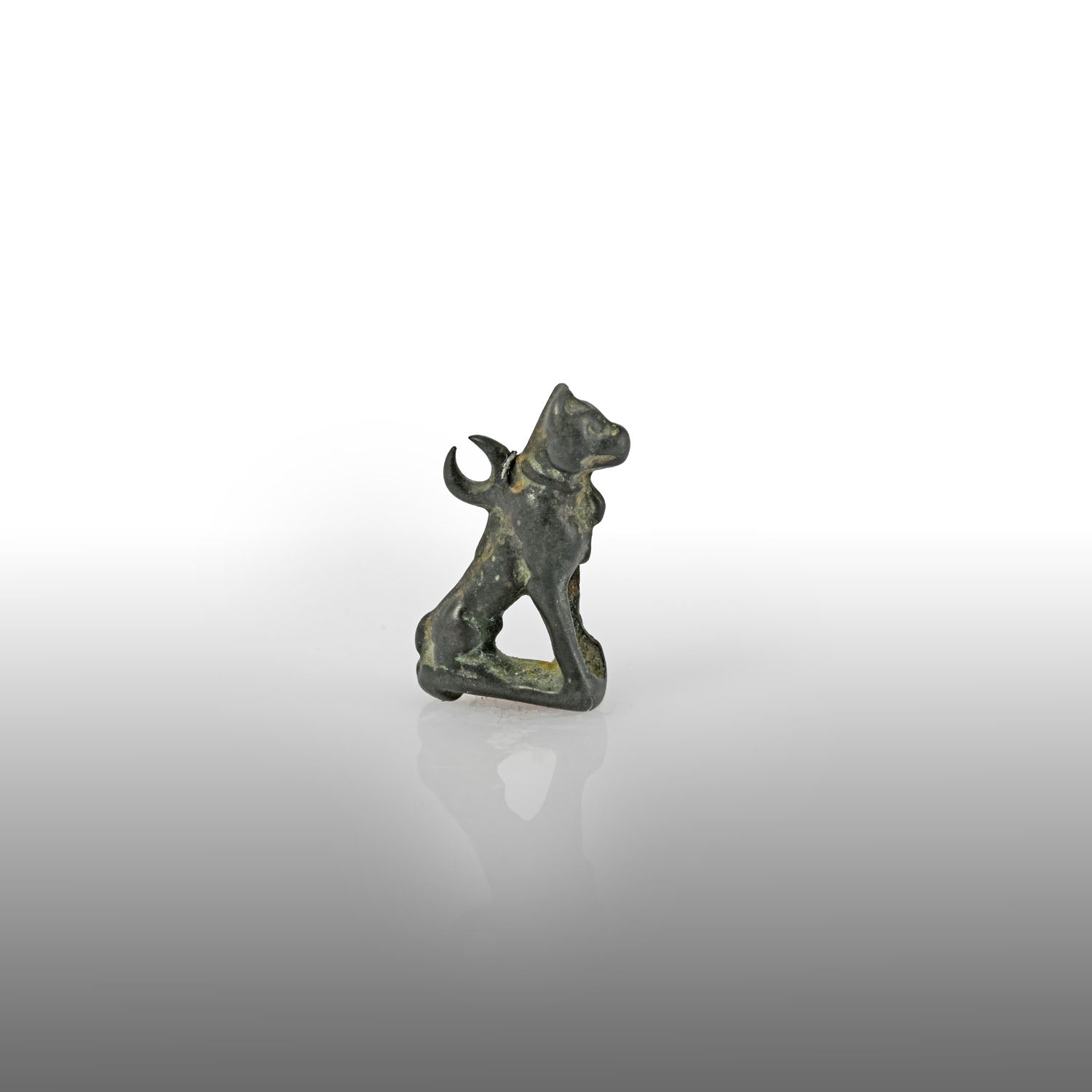 An Egyptian bronze cat amulet, 30th Dynasty, ca. 380 - 334 BCE