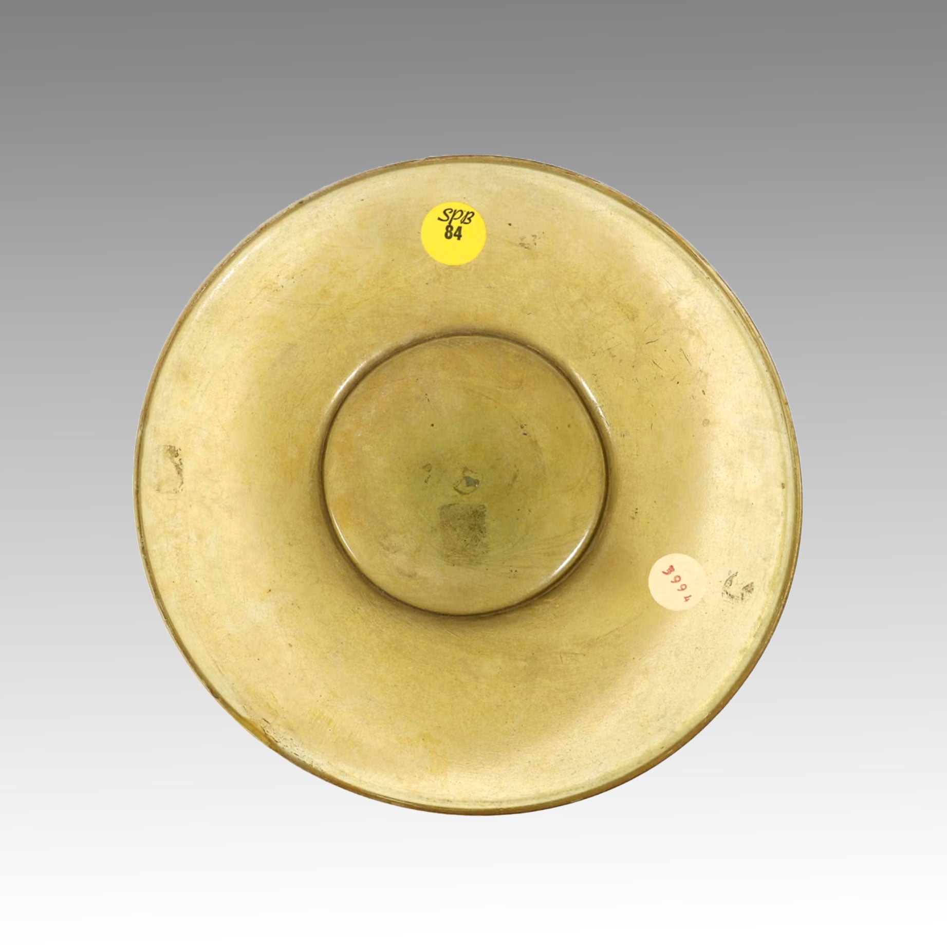 A Roman Yellow Glass Plate, Roman Imperial Period, ca. 1st century CE