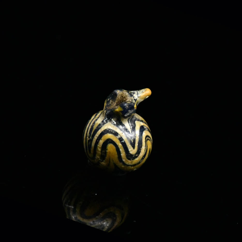 An Egyptian Glass Pomegranate Amulet, New Kingdom, 18th - 19th Dynasty, ca. 1350 - 1250 BCE