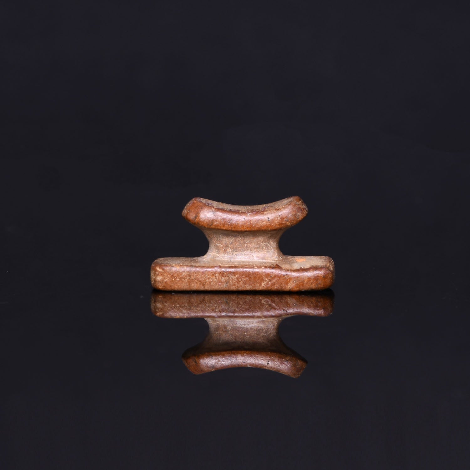 An Egyptian Stone Headrest Amulet, Third Intermediate Period, ca. 1069 - 664 BCE