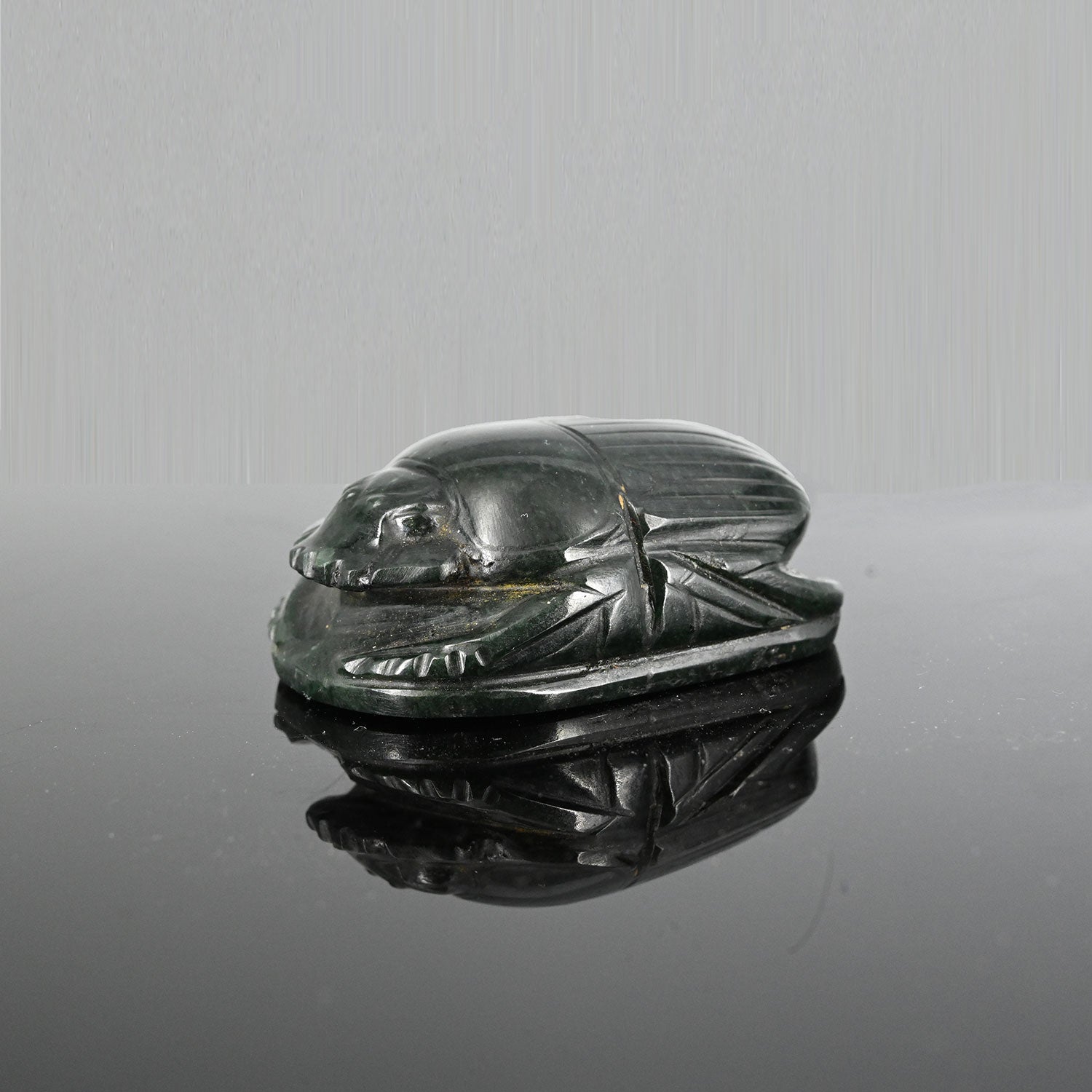 An Exhibited Egyptian Green Serpentine Heart Scarab, 26th Dynasty, ca. 664 - 525 BCE