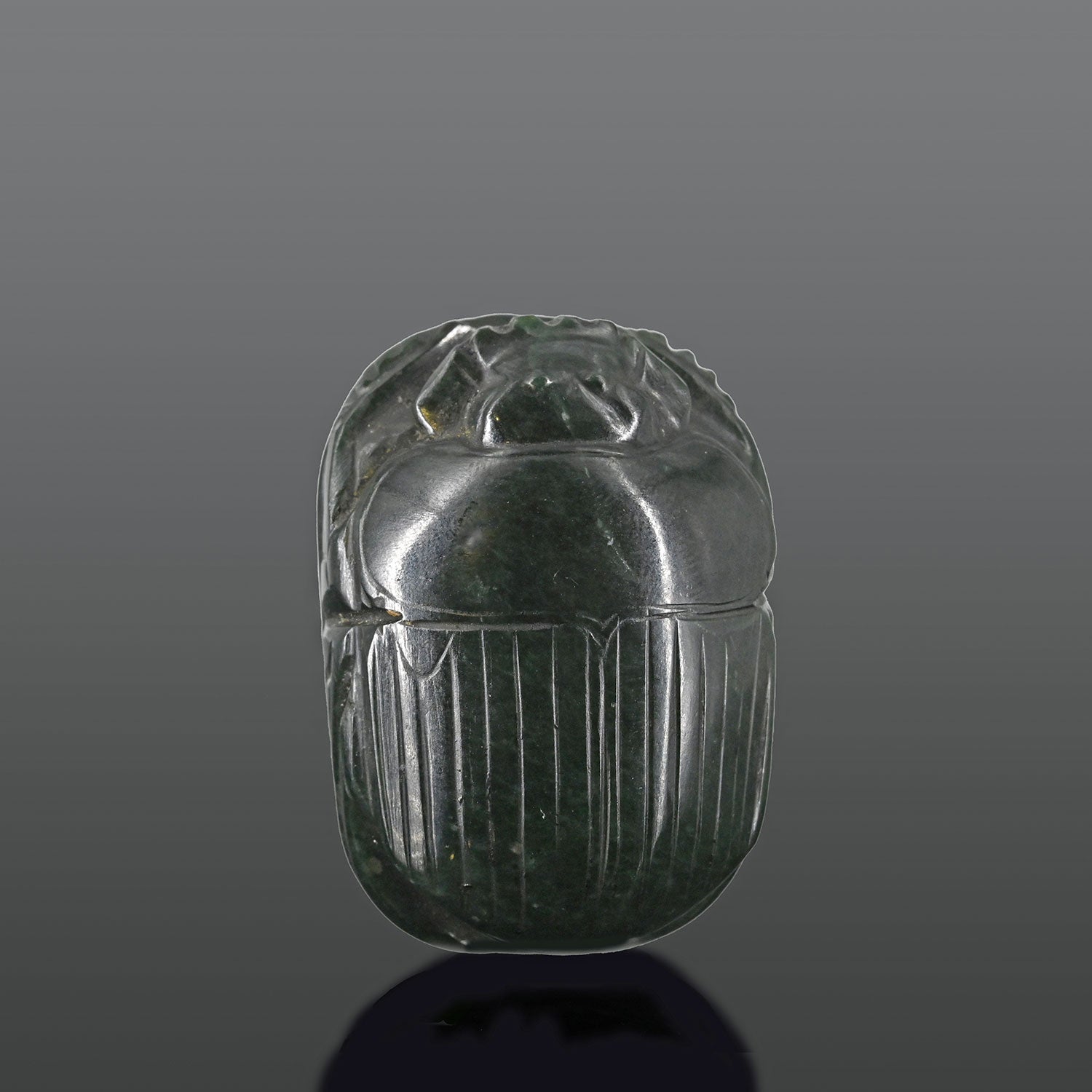 An Exhibited Egyptian Green Serpentine Heart Scarab, 26th Dynasty, ca. 664 - 525 BCE