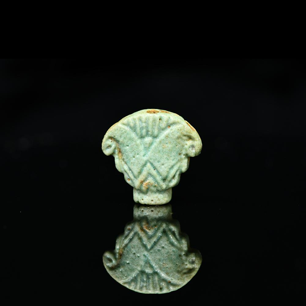 An Egyptian Faience Lotus Terminal, Late Period, ca. 664 - 332 BCE